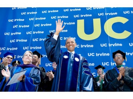 President Barack Obama waves to the UC Irvine graduating class of 2014 while flanked by UC President Janet Napolitano, at left, and Chancellor Michael Drake during the 2014 commencement ceremony at Angel Stadium. MINDY SCHAUER, ORANGE COUNTY REGISTER